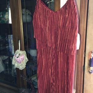 - Adam Levine copper color romper. Brand new never worn